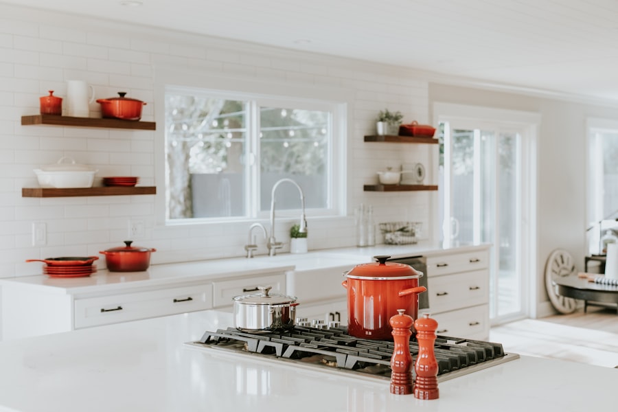 Galley kitchen resprayed in soft linen white