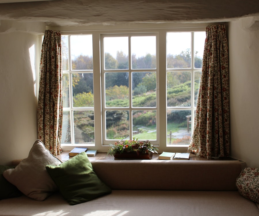 Timber window frames resprayed in heritage white